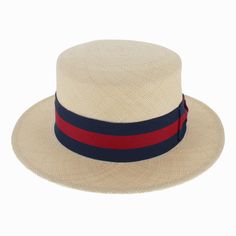 When looking for a traditional boater/skimmer, the Belfry Venice is our finest choice. It is made of tightly woven genuine Panama straw and features a flat crown and brim. The classic club hat band in navy and red striping is finished in a single bow, and adds lots of vintage style. Handmade in the USA, the Venice showcases fine American craftsmanship. FEATURESStyle: Boater/SkimmerMaterial: Genuine Panama StrawDimensions: 3 1/2 Crown, 2 1/2" BrimBand: Grosgrain Ribbon Woven Toquilla Straw Boater Hat With Flat Brim, Classic Woven Natural Boater Hat, Kentucky Derby Woven Boater Hat With Flat Brim, Beige Flat Crown Boater Hat For Kentucky Derby, Fitted Panama Hat For Kentucky Derby With Flat Crown, Fitted Beige Boater Hat With Flat Brim, Toquilla Straw Boater Hat For Kentucky Derby, Kentucky Derby Toquilla Straw Boater Hat With Flat Brim, Toquilla Straw Boater Hat With Flat Brim