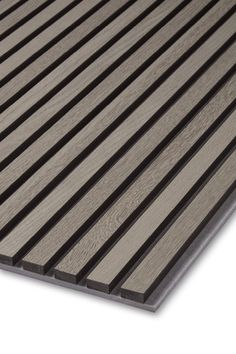 a close up view of the wood grain pattern on an outdoor decking board with grey and black slats