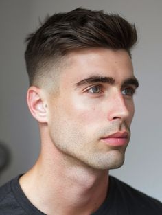 Men with thick hair can enjoy a crew cut that tames volume while still showcasing their hair’s natural fullness. This style often involves a subtle fade to reduce bulk at the sides and a layered approach on top to manage the thickness. Mens Wavy Haircuts, Young Mens Hairstyles, Mens Haircuts Straight Hair, Short Haircut Ideas, Haircut Ideas For Men, Trendy Mens Hairstyles, Short Textured Hair, Thick Hair Cuts, Mens Hairstyles Medium