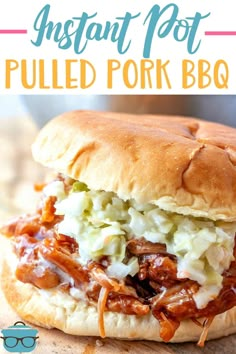 pulled pork bbq sandwich on a wooden cutting board