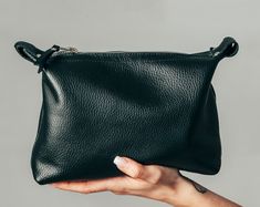 "I have created this pouch based on my needs when I travel, but I'm sure you will find it very useful as well. It is a toiletry bag, but there's nothing to stop you use it as a purse, while at work or while on holiday. It's a beautiful bag! I used a soft leather, pleased at touch, and the interior is lined with a easy to clean fabric. This is it! 23 cm (L) x 16 cm (H) x 6 cm (D) 9\" x 6.3'' x 2.36\"" Farmers Photography, Leatherworking Ideas, Camel Leather Bag, Bag For Makeup, Toilet Bag, Leather Dopp Kit, Leather Cosmetic Bag, Tech Bag, Leather Makeup Bag