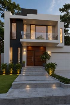 a modern house with steps leading up to it