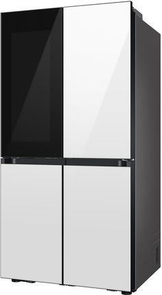 a white and black refrigerator freezer sitting next to each other