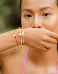 This stunning combo of colorful seed beads bracelet is perfect for your vacation looks and/or Spring Summer outfits. These bracelets are adjustable and can fit almost all sizes. Each bracelet has a cute charm attach to it reminding of the beach vacation. They come in a set of 3 (baby pink, hot pink and turquoise seed beads with flower, pineapple and a palm tree charm attached to it) Pineapple Bracelet, Semi Precious Jewelry, Silver Moon, Bangle Set, Cute Charms, Seed Bead Bracelets, Silver Cuff, Bracelets And Charms, Charm Earrings