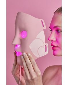 What It Is:Taking at-home devices to the next level of luxe, the LightMAX Supercharged Led Mask 2.0 is a flexible, portable, home-use mask that uses light emitting diodes (LED) to submerge the skin in light.What It Does:The LED mask delivers a duo of light options (Red + Infrared or Blue + Red) to promote total skin rejuvenation. LED therapy can help solve a plethora of skin concerns such as plumping and firming the skin, calming inflammation, diminishing breakouts and reducing hyper-pigmentatio Mascara Led, Led Light Face Mask, Face Led Mask, Face Transforming Led Mask, Led Face Mask, Led Therapy, Princess Makeover, Led Mask, Disney Princess Makeover