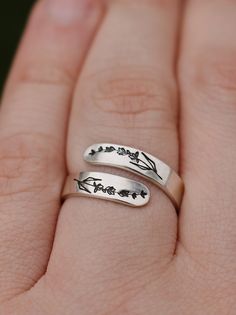 "Copy and paste into your browser, get 15% off ➔ https://bit.ly/VD15OFF Like wildflowers, you must allow yourself to grow in all the places people never thought you would. DETAILS: -Each ring is hand stamped -Ring is Aluminum or Sterling Silver -4mm in thickness You will receive one hand-stamped lavender aluminum ring filled with a black enamel finish. **Every item is handmade, this means that each will be unique and may not look EXACTLY like the picture, but it will look very similar ➡ORDER PRO Adjustable Hypoallergenic Flower Ring As Gift, Spring Gift Open Ring, Minimalist Rings As Spring Season Gifts, Minimalist Rings For Spring Gift, Minimalist Ring As Spring Season Gift, Minimalist Ring As Spring Gift, Minimalist Spring Rings For Gift, Adjustable Flower Ring For Spring Anniversary, Spring Anniversary Adjustable Flower Ring