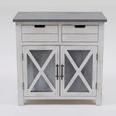 an old white cabinet with two doors and one drawer on the bottom, against a white background