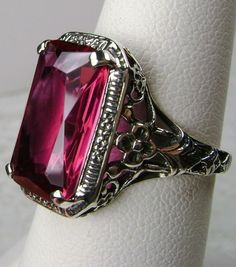 Excited to share the latest addition to my #etsy shop: 5ct Simulated Cushion Cut Ruby Sterling Silver Floral Nouveau Filigree Ring {Made To Order} https://etsy.me/31AkkMD #jewelry #ring #sterling #silver #girls #red #ruby #girlboss #fortworth #dallas Pink Rings With Intricate Design For Anniversary, Antique Ruby Ring With Filigree For Anniversary, Red Art Deco Jewelry For Wedding, Vintage Ruby Ring With Filigree For Formal Events, Ornate Ruby Ring With Intricate Design, Antique Ruby Ring For Formal Occasions, Vintage Hallmarked Ruby Ring For Formal Occasions, Antique Jewelry With Intricate Design For Promise, Vintage Filigree Ring With Gemstone As A Gift