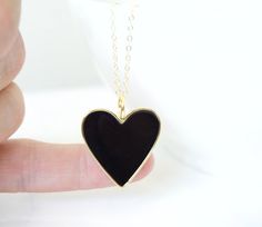 "Large Heart Necklace Pendant Anniversary Valentine's Day Your love Gift for Mom Gift for wife **This listing is for the large heart Necklace in blue or black, the model in the listing is wearing the small heart, here is the listing for the small heart necklace in blue https://www.etsy.com/listing/1014800174/gold-heart-necklace-robin-egg-blue?ref=shop_home_feat_5&pro=1 -Details Heart - 1.25\" or 28mm, approx brass and robin egg blue enamel, the back is gold and blank, not double sided Chain Black Heart Pendant Necklace Gift, Black Heart Pendant Necklace As Gift, Black Charm Necklaces As Gift, Black Heart Pendant Necklace For Gift, Personalized Black Heart Necklace For Valentine's Day, Black Heart-shaped Everyday Jewelry, Black Necklace For Valentine's Day Gift, Everyday Black Heart-shaped Jewelry, Black Charm Necklace For Valentine's Day Gift