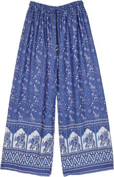 A bohemian streetwear summer pants in cobalt blue and white with a wide leg bottom - these elastic waist pants are lightweight and comfortable.  These loose-fit pants are ideal for lounge wear or yoga wear and just perfect for the beach too. #tlb #Floral #Printed #Elephant #Streetwearpajamas #WideLegPants #BeachPants #Tribalbohopants Bohemian Wide Leg Pants For Beach With Relaxed Fit, Blue Harem Pants For Spring Vacation, Blue Wide Leg Pants With Elastic Waistband, Relaxed Fit, Blue Relaxed Fit Wide Leg Pants With Elastic Waistband, Blue Wide Leg Pants With Relaxed Fit, Bohemian Blue Bottoms For Summer, Summer Bohemian Blue Bottoms, Ankle-length Blue Harem Pants For Vacation, Blue Ankle-length Pants For Vacation