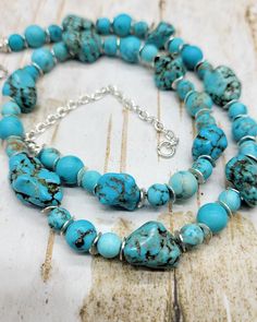 Turquoise 10 & 8mm round beads with large Turquoise Howlite nuggets, Sterling Silver plated disc spacers. 18.5-21.5 adjustable length. Turquoise Howlite, Sterling Silber, Round Beads, Favorite Jewelry, Turquoise Necklace, Necklace Etsy, Jewelry Necklace Pendant, Pendant Necklaces, Silver Plated