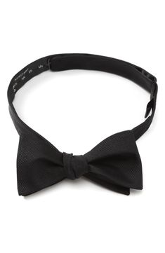 Look extra charming at your next formal event in this dapper self-tie bow tie cut from pure silk. 2" x 40" Self-tie; adjustable 100% silk Dry clean Imported Pre-tied Satin Bow For Black Tie Events, Classic Pre-tied Satin Bow Tie, Tuxedo Bow Tie With Satin Bow For Black-tie Events, Classic Bow Tie For Black-tie Events, Classic Adjustable Bow Tie For Black-tie Events, Detachable Bow For Black-tie Events, Dapper Tuxedo With Bow Tie For Black Tie Events, Tuxedo Suit And Tie Accessories For Black-tie Events, Tuxedo Bow Tie For Black-tie Events