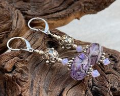 What do you think of this? Purple Swirl Bali Lampwork Earrings starting from $39.00 #handmade #SWCreations #handcrafted #fashion #jewelry Knots Jewelry, Wedding Anklets, Lampwork Focal Bead, Purple Swirl, Lampwork Earring, Christmas Earrings, Purse Charms, Lampwork Glass Beads, Lampwork Beads