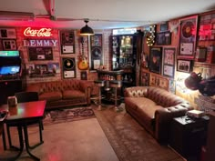 a living room filled with lots of furniture and decor