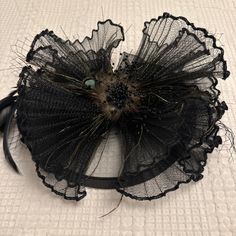 Beautiful And Elegant Black Fascinator. Perfect For A Kentucky Derby Event! Made Of Mesh And Organza. Floral Pattern. Clip Closure Wore Only Once. Chic Black Wedding Headpiece, Vintage Black Fascinator For Party, Chic Black Fascinator For Evening, Fitted Black Headband For Costume Party, Black Fitted Fascinator For Party, Fitted Black Fascinator For Party, Black Fitted Fascinator For Evening, Fitted Black Fascinator For Evening, Elegant Black Fascinator For Evening