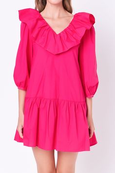 This sweet and chic ruffled mini is perfect for dressing up or dressing down. With a flattering v-neckline and delicate ruffle detail, this mini is perfect for showing off your curves. Made with a soft and lightweight fabric, it's perfect for layering. Dress it up with heels or dress it down with sandals - either way, you're sure to fall in love with our ruffled mini. V neckline Ruffle detail 3/4 puff sleeve Mini length Lining Hand wash cold Do not bleach Do not tumble dry Iron low Shell: 100% Cotton Lining: 80% Polyester 20% Cotton HN1196D Total length :33.75" Bust :36.5" S Height 5'9"/(175cm) / Bust 30"/(76.5cm) / Waist 24.5"(62cm) / Hip 34"(86cm) Pink V-neck Mini Dress With Ruffle Hem, Chic Pink V-neck Ruffle Dress, Chic V-neck Ruffle Dress, Feminine V-neck Ruffle Dress With Ruffle Hem, Spring V-neck Dress With Ruffles, Feminine Spring V-neck Dress With Ruffles, Chic Summer Ruffle Dress With Ruffled Collar, V-neck Ruffle Mini Dress For Date Night, Flirty V-neck Dress For Brunch