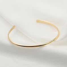 "14K gold cuff bracelet. 14K Gold Minimalist Cuff Bracelet, Delicate cuff bracelet. The bracelet will be shipped in a gift box * 14K solid gold. It is about 2.5mm width. Please select the size of your wrist. If your wrist is 6\", please purchase a 6\" bracelet. (If you order a 6\" bracelet, actual cuff length will be 5\" plus 1 inch opening.) Please read our policies before you place your order. https://www.etsy.com/shop/SashJewelry/policy?ref=shopinfo_policies_leftnav To see other Mother daught Gold Open Cuff Elegant Jewelry, Elegant Gold Open Cuff Jewelry, Gold Open Band Bracelets As Gift, Gold Open Band Bracelet As Gift, Gold Open Band Bracelet Gift, Gold Open Band Bangle Gift, Luxury Open Band Cuff Bracelet As Gift, Luxury Open Band Cuff Bracelet For Gift, Elegant Gold Open Band Bangle