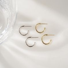 Beautiful dainty diamond hoop earrings that can be worn alone for a pop of bling, or paired with huggies! They're the perfect size and lightweight, great for any occasion :) Made of 925 Sterling Silver THICK plating of 14k Gold or Rhodium Inner diameter: 12mm; Outer diameter: 16mm 2mm thick Sold as a PAIR Made of highest quality cubic zirconia VERY HIGH QUALITY Nickel-free & Hypoallergenic - great for sensitive ears! Super light-weight Earrings on Model: Pavé Huggies 🎁 Comes in a gift-box, read Minimalist Tarnish Resistant Hoop Earrings For Anniversary, Minimalist Tarnish-resistant Hoop Earrings For Anniversary, Minimalist Hypoallergenic Hoop Earrings For Anniversary, Minimalist Hoop Earrings For Anniversary, Minimalist Round Huggie Earrings For Everyday, Trendy Tarnish Resistant Hoop Earrings For Anniversary, Minimalist Everyday Round Huggie Earrings, Everyday Minimalist Round Huggie Earrings, Trendy Small Hoop Sterling Silver Huggie Earrings