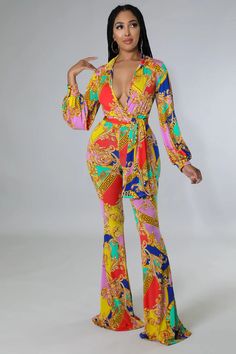 Elevate your style game with our Women's Flare Bottom V Neck Bodysuit Pant Set! The multi-color design adds a unique touch, while the V-neck and flare bottom create a flattering silhouette. Perfect for any occasion, this set is a must-have addition to your wardrobe. Two piece set Stretch bodysuit Collar V neck Long sleeves No closure High waisted pants Elastic waistband Flare bottoms No closure Scarf included 95% polyester 5% spandex Hand wash cold Inseam is 37 inches Model is wearing a small MO Multicolor Printed Stretch Jumpsuits And Rompers, Multicolor Stretch Printed Jumpsuits And Rompers, Stretch Multicolor Printed Jumpsuits And Rompers, Multicolor Printed Long Sleeve Jumpsuits And Rompers, Multicolor Printed Party Bottoms, Trendy Multicolor Printed Pants, Fitted Multicolor Sets With Vibrant Print, Fitted Multicolor Printed Jumpsuits And Rompers, Spring Multicolor All Over Print Set