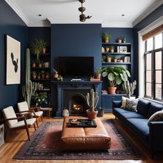 a living room filled with furniture and a fire place next to a tv mounted on a wall