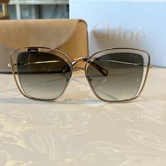 Metal Frame With Black Semi Transparent Lenses Chloe Sunglasses, Semi Transparent, Colored Sunglasses, Glasses Accessories, Gold Black, Metal Frame, Chloe, Square Sunglass, Lenses