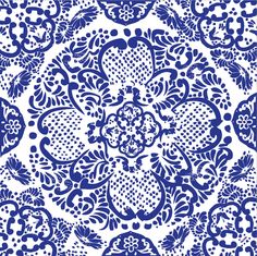 a blue and white floral pattern on a white background, it looks like an intricate ornament