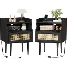 two black nightstands with wicker baskets on each side and one has an alarm clock