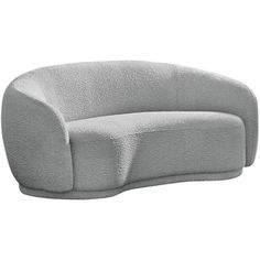 a gray couch sitting on top of a white floor