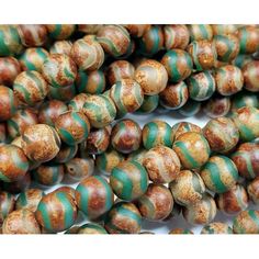 green and brown striped glass beads