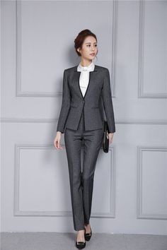 If you are looking forward to making heads turn at work, get home this set of Pantsuit with Jacket. Made from cotton, microfiber, and polyester, this pantsuit set is available in black and grey color. It is perfect workwear for ladies who are looking for something comfortable and stylish. With a smooth finish, this pantsuit and jacket set is a perfect autumn-winter wear.

Specifications
Gender: Women
Item Type: Pant Suits
is_customized: Yes
Clothing Length: Regular
Closure Type: Single Breasted Gray Slim Fit Suits For Work, Professional Long Sleeve Sets For Business Casual, Classic Office Sets For Winter, Winter Slim Fit Suits For Office, Winter Slim Fit Office Suits, Winter Office Slim Fit Suits, Slim Fit Winter Office Suits, Professional Slim Fit Workwear Sets, Winter Workwear Sets With Suit Collar