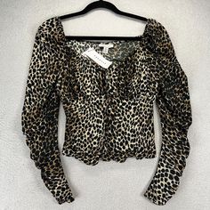 Description: Topshop Leopard Crop Top Puff Long Sleeve Size 6 Smocked Black Animal Print Nwt Condition: New With Tags Additional Notes: - No Visible Stains, Wear, Tears, Or Flaws, Unless Specifically Pointed Out In Photos - From Smoke Free Home - Open To Reasonable Offers Measurements: Taken In Photos And With The Garment Laying Flat And Unstretched. Compare With A Similar Garment That Fits You To Determine Fit. Shipping: We Aim To Ship Within One Business Day, No Later Than Two. Color: We Photograph Items As Accurately As Possible; However, Colors May Vary Depending On Your Monitor And The Lighting. We Strive To Provide Accurate Descriptions, But Details Might Be Overlooked. If You Trendy Long Sleeve Smocked Top For Fall, Trendy Long Sleeve Stretch Smocked Top, Black Long Sleeve Smocked Top Trendy, Stretch Smocked Long Sleeve Top For Fall, Black Long Sleeve Top With Smocked Bodice, Trendy Long Sleeve Smocked Top With Ruched Detail, Trendy Black Smocked Top For Fall, Trendy Long Sleeve Ruched Smocked Top, Long Sleeve Top With Smocked Bodice For Night Out