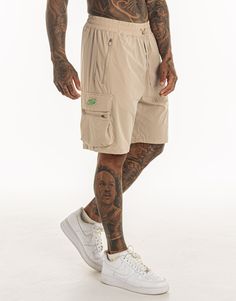 Designed for all-day wear, the Spear Shorts offer the functionality of a workout short, with the style for all season wear - Technical Four-Way Stretch - Nylon Stretch Fabric - Reinforced Stitching - Drawcord Ribbed Waistband - Knee Length 87% Nylon, 13% Elastane Workout Short, Joggers Track Pants, Taupe Grey, A Workout, Jogger Sweatpants, Tight Leggings, Sport Shorts, Track Pants, Long Sleeve Hoodie