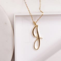 "J Initial Necklace - Cursive \"J\" initial gold pendant necklace - Monogram necklace for women - Personalized gold Initial necklace for her Dainty \"J\" initial. Perfect every day necklace. Lovely gift for your self, sister, bridesmaids, new mom. Convo me if you would like to customize the length of the chain. The possibilities are endless. Pendant: Base metal is brass and 16K gold plated. Chain is 18 inches, 14 gold filled. (if you would like a longer or shorter chain, please contact us to cus J Pendant Necklace, J Necklace Initial, Alphabet Necklace Initials, J Initial Necklace, Cursive J, Punjab Culture, Opals Jewelry, Planned Outfits, J Letter