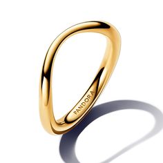 From Pandora, choose sleek simplicity when you wear the Organically Shaped Band Ring. Crafted of Pandora's 14k gold-plated unique metal blend, this polished ring band features an organic look, varying in thickness for an undulating effect. A playful reimagining of a standard linear silhouette, this ring's curves make it a fresh addition to your favorite stack. Use it as an accent piece to pair with different metal tones, stones and colors, or stack similar simple styles for a sleek result. Pando Gold Accent Rings, Womens Gold Band Ring, Gold Ring Pandora, Simple Gold Ring Stack, Sleek Gold Ring For Gift, Pink And Gold Ring, Gold Pandora Rings, Pandora Stackable Rings, Simple Gold Ring