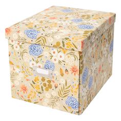 a floral fabric storage box with handles