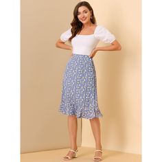 Through the summer seasons in this effortlessly chic flowy skirt. In a midi silhouette that wraps around, this skirt exudes the spring-summer feel you can't wait for. Sitting high on the waist, the light and breezy fabric trimmed with ruffles falls to a split skirt for impact and movement as you walk. Cut in a flared shape, this skirt is designed with a button closure at the side flattering for showing your looming legs. Adding a beautiful floral flourish for feminine appeal, this style is a fus Flowy Summer Midi-length Bottoms, Feminine Midi Skirt For Summer, Summer Feminine Midi Skirt, Feminine Summer Midi Skirt, Non-stretch Summer Midi Skirt, Feminine Midi-length Summer Skirt, Chic Knee-length Spring Wrap Skirt, Feminine Midi Length Summer Skirt, Midi Length Ruffled Skirt For Day Out