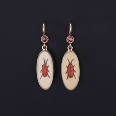 Add a touch of edge to any ensemble with these fun insect earrings! To create these earrings, our jeweler carefully cut antique shibayama game pieces (circa 1880) into an oval shape, mounted them in 14k gold, and added 14k ear wires and ruby surmounts. Each earring measures 1.1 inches from the top of the ear wire to bottom by 0.3 inches wide, and they are in excellent condition. We have many other fantastic offerings of period fine jewelry posted on our Etsy store, so please consider browsing ou Funky Earrings Vintage, Insect Earrings, Gold Ruby Earrings, Whimsical Earrings, Insect Jewelry, Earrings Art, Jewelry Post, Dope Jewelry, Fun Jewelry