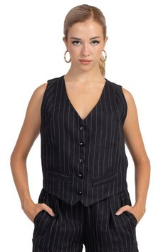 Black pinstriped patterned vest, Argentine Tango vest for women, Ladies elegant suit vest, Tailored pes waistcoat, V neck vest with buttons Black Pinstripe Women's Suit Vest Balance your feminine and masculine energy with this wardrobe staple waistcoat.  Pair it with the matching pinstripe trousers : https://www.etsy.com/listing/1555866711/black-pinstriped-patterned-pants-womens or your favorite jeans for a casual look. ✤ Fabric Pes ✤ Pinstriped Pattern ✤ V-Neckline ✤ Front Button Closure ✤ Fron Pinstripe Vest For Work, Elegant Tailored Pinstripe Vest, Elegant Pinstripe Vest For Formal Occasions, Chic Striped V-neck Vest, Classic Striped Vest For Work, Classic Pinstripe Vest For Formal Occasions, Classic Pinstripe Formal Vest, Chic Fitted Pinstripe Vest, Elegant Pinstripe Sleeveless Vest