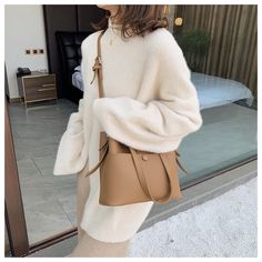 Poppy Bag Material: PU, Polyester Colors available: Black, Brown, Beige, Khaki length 25.5cm*height 22cm*width 11cm Note: 1 Inch=2.54 CM; 1 CM=0.39 Inch, Due to different batches, the bag's liner may be different. We pay your attention to the fact that different computer screens can display different colors even though this is one and the same color. Therefore the color of the received good can be a little bit different than the good on the photo. Fall Everyday Use Satchel Phone Bag, Fall Satchel Phone Bag For Everyday Use, Solid Color Bags With Detachable Strap For Fall, Bags With Detachable Strap For Fall, Fall Bucket Shoulder Bag With Detachable Strap, Fall Shoulder Bag With Detachable Strap And Bucket Shape, Everyday Rectangular Phone Bag For Fall, Everyday Satchel With Mobile Phone Bag For Fall, Rectangular Fall Phone Bag For Everyday