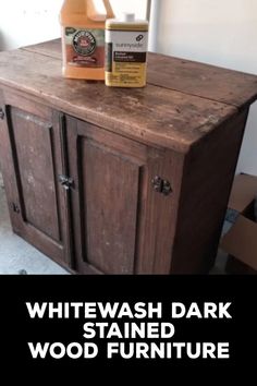 an old wooden cabinet with a bottle of wood furniture cleaner on top and the words, whitewash dark stained wood furniture