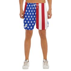 a man wearing an american flag swim trunks