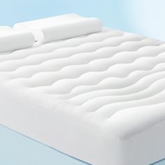 the mattress is made up and ready for someone to use it on their bedding