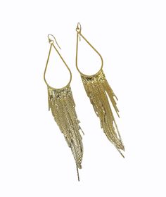 These long gold tassel earrings are lightweight, long, and chic. They shimmer, shine, and are perfect for day or night. A boho-chic pair of earrings for women.- gold or silver your choice.- 14k gold-filled or sterling silver ear wires your choice.- drop length of the earring is 5-7/8 inches {145mm}. - Your jewelry will come packaged for gift giving. Silver Long Drop Earrings With Tassels, Elegant Long Drop Tassel Chandelier Earrings, Elegant Long Drop Chandelier Earrings With Tassels, Evening Dangle Tassel Jewelry, Evening Tassel Dangle Jewelry, Elegant Long Drop Tassel Jewelry, Chic Silver Jewelry With Tassels, Elegant Metal Fringe Jewelry, Elegant Long Drop Fringe Earrings