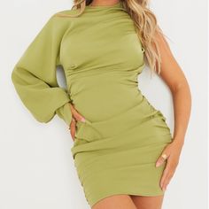 Sage Green One Sleeve Ruched Woven Bodycon Dress, Size Uk 12 / Us 8 / Medium. Brand New With Tags. Stretch Mini Dresses With Gathered Sleeves, Green Knee-length Mini Dress With Gathered Sleeves, Spring Fitted Draped Mini Dress, Fitted Draped Mini Dress For Spring, Green Stretch Mini Dress For Brunch, Spring Draped Ruched Bodycon Dress, Fitted Green Mini Dress With Ruched Detail, Fitted Green Ruched Mini Dress, Green Ruched Mini Dress For Cocktail