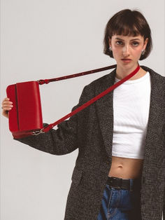 Elevate your style with our Leather Shoulder Bag in bold Red. Crafted for the fashion-forward individual, this bag seamlessly blends modern design with everyday functionality. Designer Shoulder Bag, Designer Shoulder Bags, Vegetable Tanned Leather, Italian Leather, Red Leather, Leather Shoulder Bag, Sleek Design, Shoulder Bags, Fashion Forward