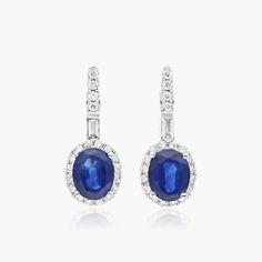 pair of blue sapphire and diamond earrings in 18k white gold, set with diamonds