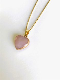 "I once had a thousand desires, but in my one desire to know you, all else melted away." - Rumi This rose quartz necklace is the perfect gift for birthday or just to say "I love you." This rose quartz necklace is an excellent gift idea for yourself or loved one. It is made of natural rose quartz, which has the healing properties of joy, abundance, love, and also energy. The chain is 18K gold plated over silver 925 and the charm is rose quartz and 18k gold plated over brass. Chain length 45 cm. C Dainty Heart Pendant Necklace For Birthday, Rose Gold Heart Cut Necklace As Gift, Dainty Heart Necklace With Gemstone For Valentine's Day, Delicate Gemstone Crystal Necklace As Gift, Heart Charm Open Heart Necklace For Birthday, Rose Gold Crystal Gemstone Necklace For Gift, Dainty Heart Pendant Jewelry For Birthday, Open Heart Charm Necklace For Birthday, Spiritual Heart Beads Necklaces As Gifts