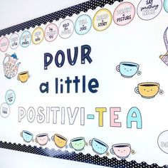 a sign that says pour a little positiv - tea on the side of a wall