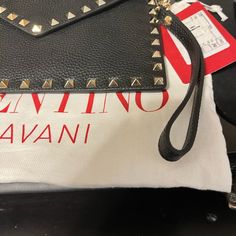 Brand New Valentino Garavani Black Calf Skin Envelope Pouch. Not Org Strap Designer Shoulder Bag Pouch, Luxury Envelope Shoulder Bag For Shopping, Evening Envelope Bag With Gold-tone Hardware, Designer Pouch With Detachable Strap For Shopping, Designer Black Clutch Shoulder Bag, Designer Envelope Shoulder Bag For Travel, Designer Clutch With Top Handle, Designer Black Shoulder Bag Clutch, Designer Top Handle Clutch For Shopping