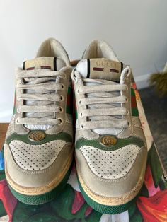 Authentic Gucci Screener Sneakers in excellent condition. Worn once but they don't fit me, sadly. Size 37, fit like a US 7.5. Classic Gucci sneakers featuring the Gucci stripes and classic green sole with bee design. Made in Italy. Please note: this style has some intentional distressing. Approximate measurements.Heel to toe: 10.5"Width: 3.75" Luxury Green Low-top Sneakers, Designer Low-top Sneakers With Gum Sole, Designer Green Low-top Custom Sneakers, Designer Green Lace-up Sneakers, Gucci Sneakers, Bee Design, Stripes, Gucci, Sneakers